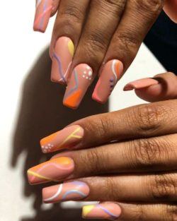 Uñas largas rosa con sibujos