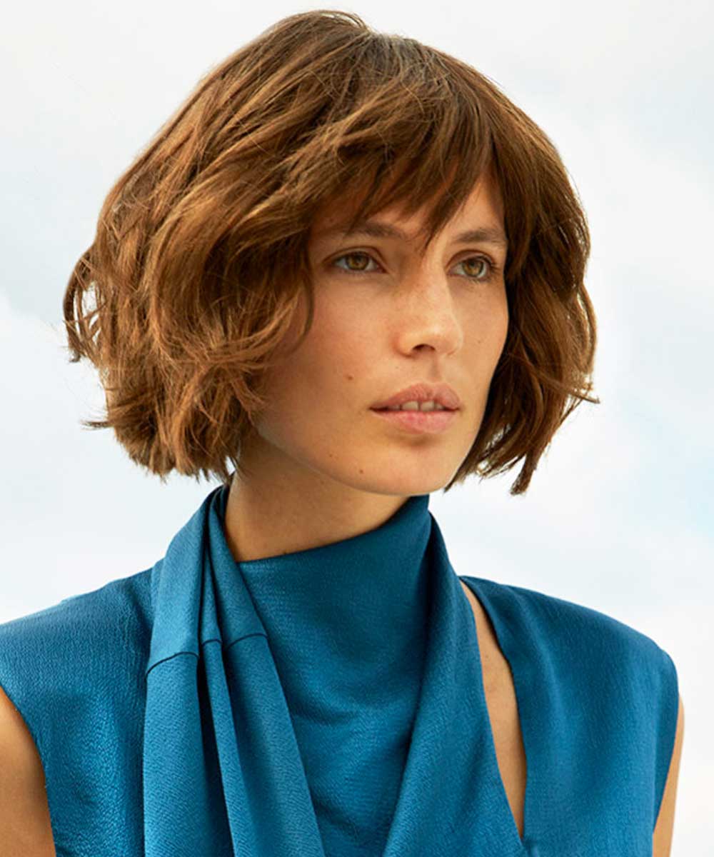 Pelo corto de mujer con flequillo