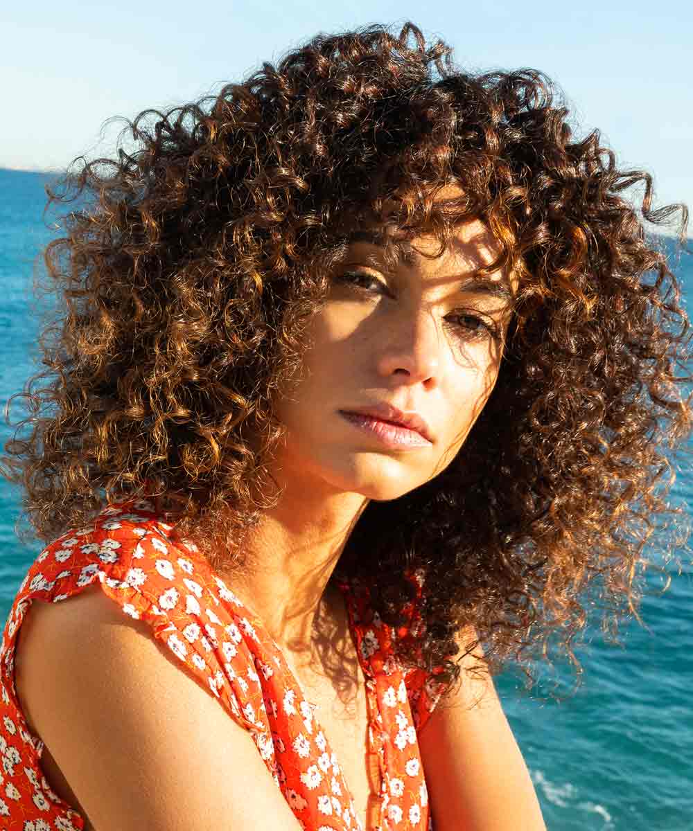 Pelo rizado y ondulado escamado Pelo rizado y ondulado escamado