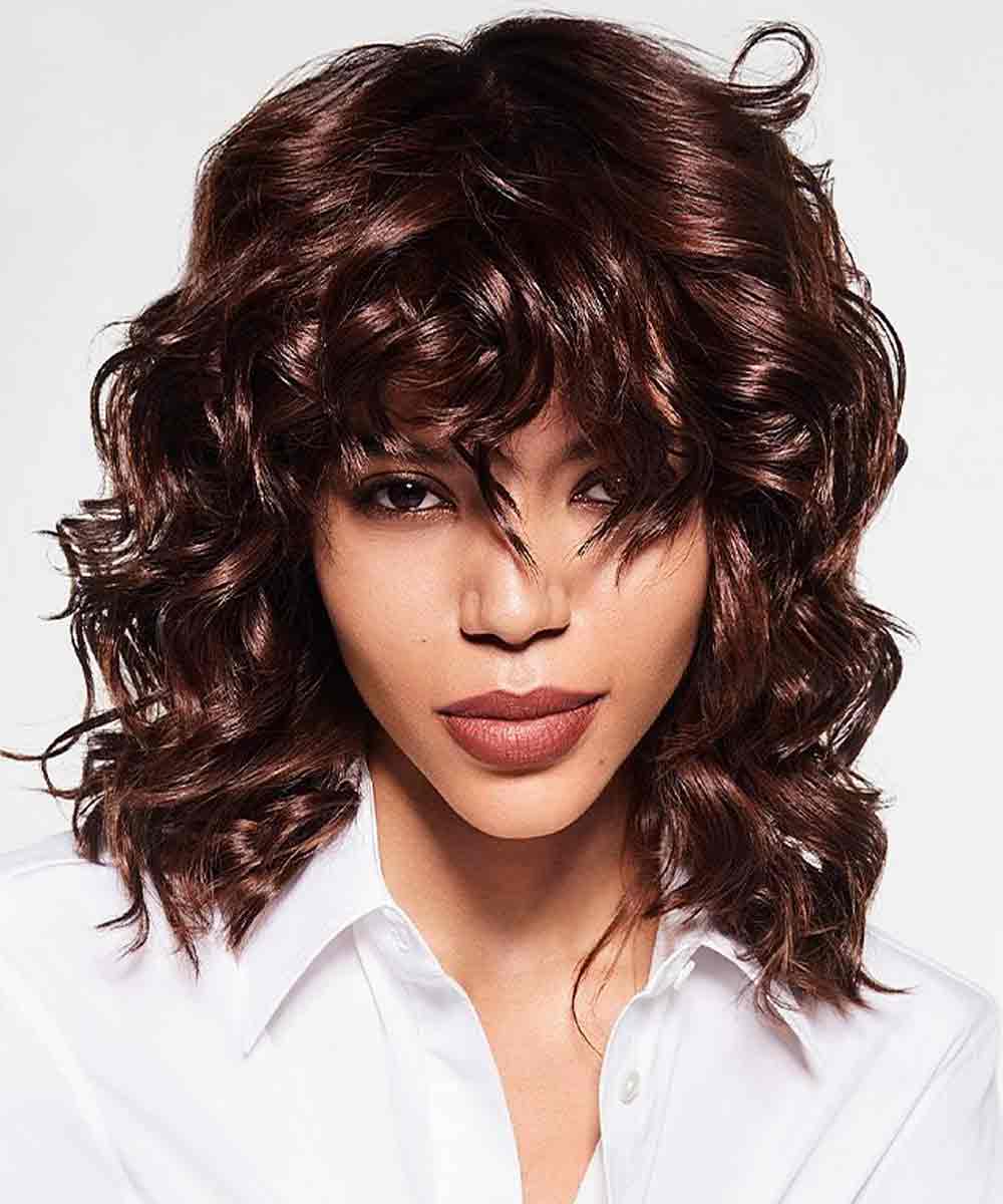 Flequillo de pelo ondulado medio Flequillo de pelo ondulado medio