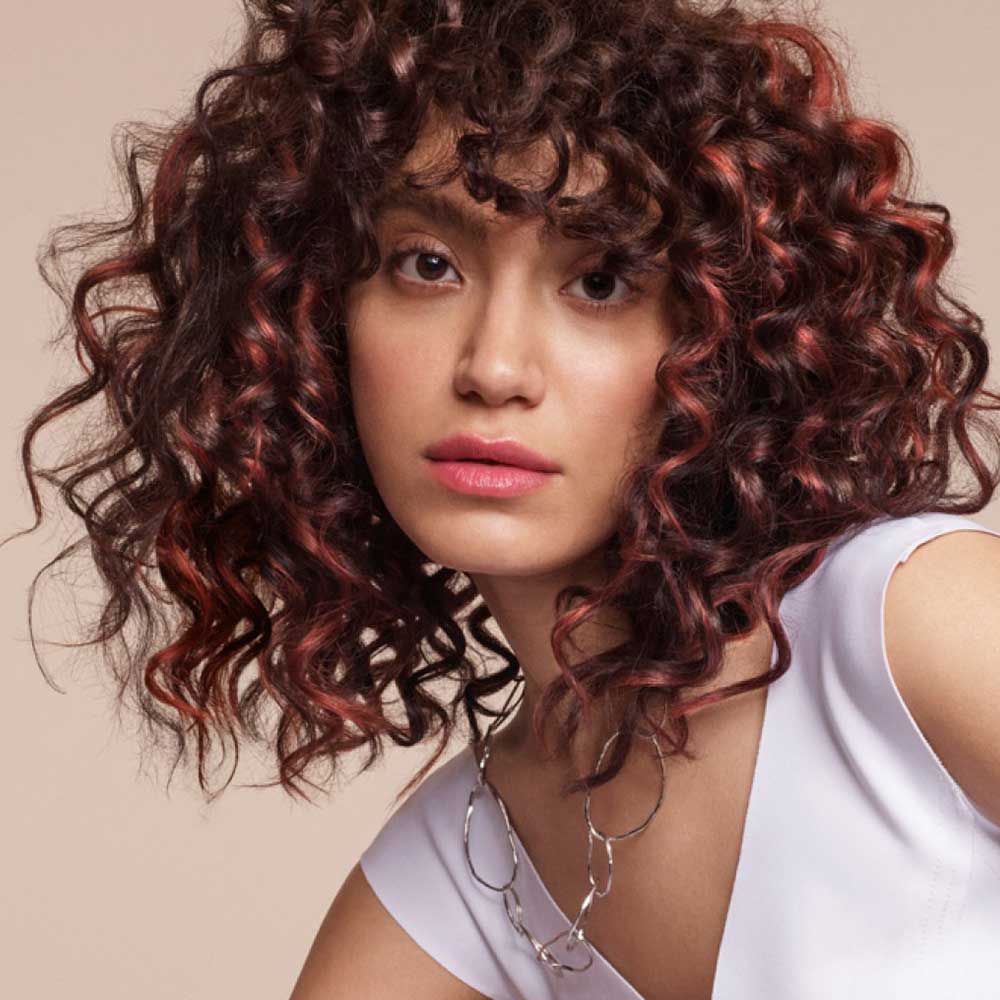 Cortes de pelo medio ondulado Cortes de pelo medio ondulado